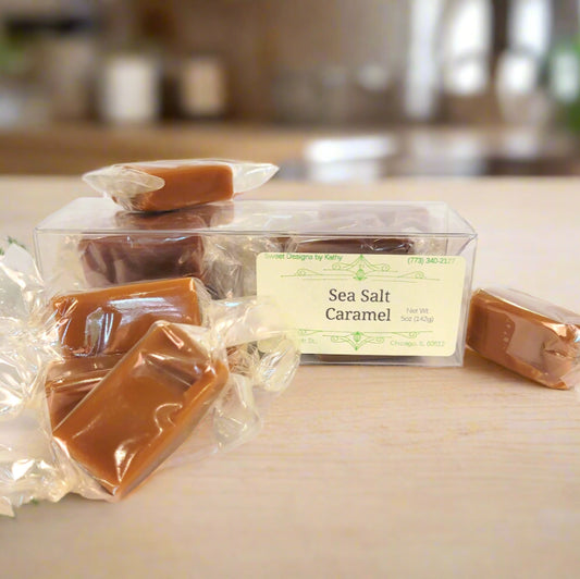 Packaged sea salt caramel with individual pieces on a light background