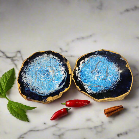 Two geometric chocolate shapes with Aztec Hot Chocolate caramel inside