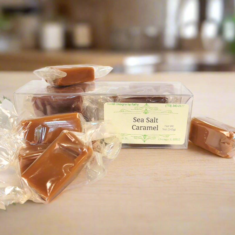 Packaged sea salt caramel with individual pieces on a light background