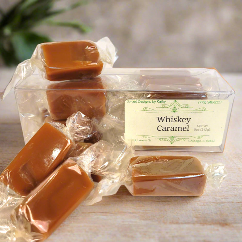 Whiskey caramel candies in clear packaging with a label.