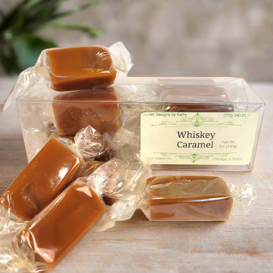 Whiskey caramel candies in clear packaging with a label.